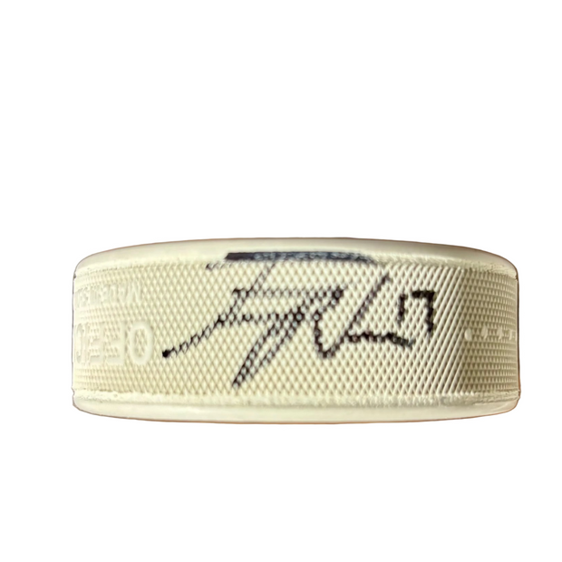 Team Autographed Puck 2026